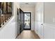 Inviting entryway with wood floors and white wainscoting at 1504 Oldenburg Dr, Mount Pleasant, SC 29466