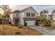 Two-story house with stone accents and a two-car garage at 1504 Oldenburg Dr, Mount Pleasant, SC 29466