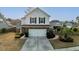 Two-story house with stone accents and a two-car garage at 1504 Oldenburg Dr, Mount Pleasant, SC 29466