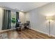 Bright home office with large window, hardwood floors, and ample workspace at 1504 Oldenburg Dr, Mount Pleasant, SC 29466