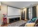Basement home theater room with projector, screen, and comfortable seating at 1504 Oldenburg Dr, Mount Pleasant, SC 29466