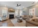 Spacious living room featuring a fireplace and large windows at 1504 Oldenburg Dr, Mount Pleasant, SC 29466