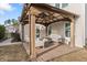 Covered patio with seating area, perfect for outdoor relaxation at 1504 Oldenburg Dr, Mount Pleasant, SC 29466