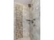 Modern shower with a mosaic tile accent wall and a spacious design at 1504 Oldenburg Dr, Mount Pleasant, SC 29466
