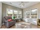 Relaxing sunroom featuring a comfortable recliner and large windows at 1504 Oldenburg Dr, Mount Pleasant, SC 29466