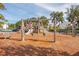 Wooden playground with swings and play structures at 1522 Pearl Tabby Dr, Mount Pleasant, SC 29466