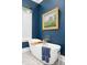 Bathroom with a white bathtub and blue walls at 155 Wingo Way # 418, Mount Pleasant, SC 29464