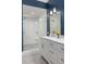 Bathroom with white vanity and a walk-in shower at 155 Wingo Way # 418, Mount Pleasant, SC 29464
