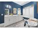 Elegant bathroom with white cabinets and a freestanding tub at 155 Wingo Way # 418, Mount Pleasant, SC 29464