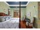 Bedroom with yellow floral wallpaper and two armchairs at 155 Wingo Way # 418, Mount Pleasant, SC 29464