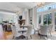 Bright dining area with large windows and elegant seating at 155 Wingo Way # 418, Mount Pleasant, SC 29464