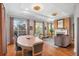 Bright dining room with hardwood floors and large windows at 155 Wingo Way # 418, Mount Pleasant, SC 29464