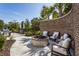 Relaxing outdoor fire pit area with comfortable seating and brick accents at 155 Wingo Way # 418, Mount Pleasant, SC 29464