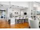 Modern white kitchen with stainless steel appliances and breakfast bar at 155 Wingo Way # 418, Mount Pleasant, SC 29464