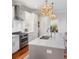 Modern kitchen with white cabinets and marble countertops at 155 Wingo Way # 418, Mount Pleasant, SC 29464
