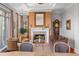 Elegant living room with fireplace and hardwood floors at 155 Wingo Way # 418, Mount Pleasant, SC 29464