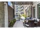 Inviting patio with seating area and tranquil water feature at 155 Wingo Way # 418, Mount Pleasant, SC 29464