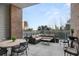 Outdoor patio with seating area and scenic wooded views at 155 Wingo Way # 418, Mount Pleasant, SC 29464