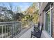 Charming patio with rocking chairs, offering tranquil views at 155 Wingo Way # 418, Mount Pleasant, SC 29464