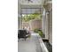 Tranquil outdoor patio with a water feature and lush greenery at 155 Wingo Way # 418, Mount Pleasant, SC 29464