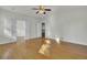 Spacious bedroom with hardwood floors and access to other rooms at 1857 Palmetto Isle Dr, Mount Pleasant, SC 29466