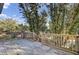 Wooden deck overlooks a lush, wooded backyard at 1857 Palmetto Isle Dr, Mount Pleasant, SC 29466