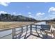 Relaxing wooden dock features bench and water access at 1857 Palmetto Isle Dr, Mount Pleasant, SC 29466