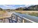 Serene dock provides peaceful water views and seating at 1857 Palmetto Isle Dr, Mount Pleasant, SC 29466