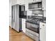 Stainless steel appliances and granite countertops in this kitchen at 1857 Palmetto Isle Dr, Mount Pleasant, SC 29466