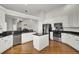 Spacious kitchen with island, stainless steel appliances, and granite countertops at 1857 Palmetto Isle Dr, Mount Pleasant, SC 29466
