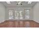 Sunroom with terracotta tile floor and French doors leading to a deck at 1857 Palmetto Isle Dr, Mount Pleasant, SC 29466