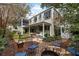 Charming backyard with firepit and brick patio at 209 Bennett St, Mount Pleasant, SC 29464