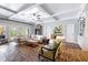 Spacious basement with brick floors, and comfortable seating at 209 Bennett St, Mount Pleasant, SC 29464