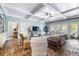 Spacious basement with brick floors, comfortable seating and access to backyard at 209 Bennett St, Mount Pleasant, SC 29464