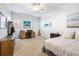 Bright bedroom featuring a comfortable bed and a workspace at 209 Bennett St, Mount Pleasant, SC 29464