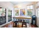 Bright breakfast nook with farmhouse table and French doors at 209 Bennett St, Mount Pleasant, SC 29464