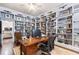 Home office with built-in bookshelves and a desk at 209 Bennett St, Mount Pleasant, SC 29464