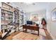 Home office with built-in bookshelves and a desk at 209 Bennett St, Mount Pleasant, SC 29464