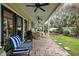 Covered patio with seating and ceiling fans at 209 Bennett St, Mount Pleasant, SC 29464