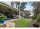 Spacious patio with seating, grill, and lawn at 209 Bennett St, Mount Pleasant, SC 29464