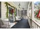 Inviting porch with rocking chairs and festive holiday decor at 209 Bennett St, Mount Pleasant, SC 29464