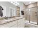 Bathroom with double vanity, granite countertop, and walk-in shower at 234 Oak Park St, Summerville, SC 29486