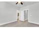 Spacious bedroom with neutral walls, ceiling fan and access to bathroom at 234 Oak Park St, Summerville, SC 29486
