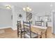 Open dining room with rustic table and kitchen view at 234 Oak Park St, Summerville, SC 29486