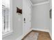 Bright entryway with hardwood floors and coat rack at 234 Oak Park St, Summerville, SC 29486