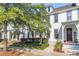 White house with red door, landscaping, and a walkway at 234 Oak Park St, Summerville, SC 29486