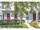 Two-story white houses with red doors and green landscaping at 234 Oak Park St, Summerville, SC 29486
