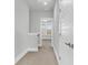 Upper hallway with carpet, neutral walls, and access to bedrooms at 234 Oak Park St, Summerville, SC 29486