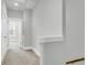 Upper hallway with carpet, neutral walls, and access to bedrooms at 234 Oak Park St, Summerville, SC 29486