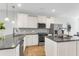 Modern kitchen features stainless steel appliances and dark countertops at 234 Oak Park St, Summerville, SC 29486